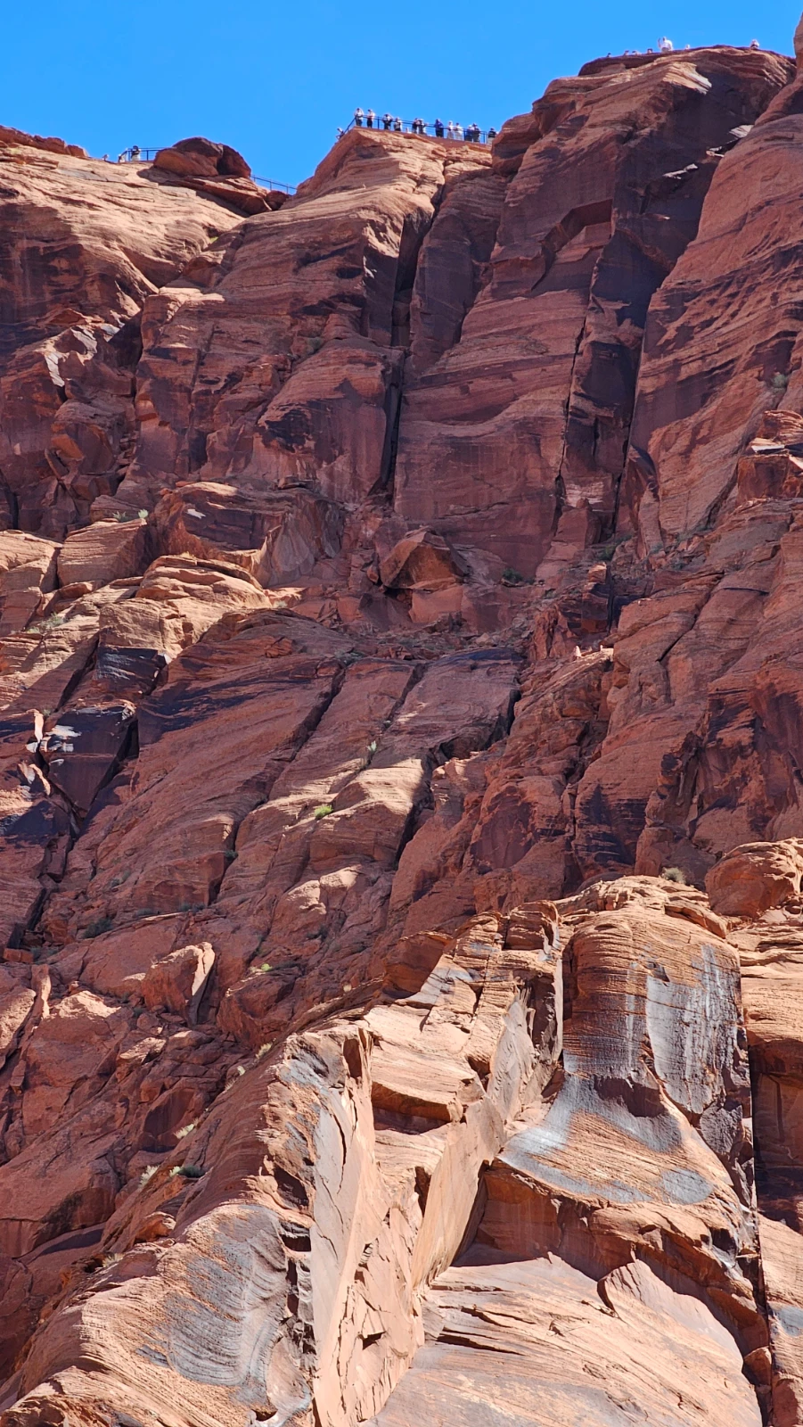 Get the zoom lens out if you want to see the people on the rim looking down. Be prepared to be in a lot of other people's photos! Photo Credit: Andy Goldberg